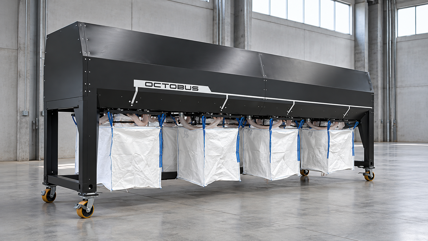 Illustrative reconstruction of OCTOBUS with removable collection bags beneath the machine in an industrial hall